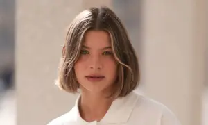 Mujer con un moderno corte bob a capas, con ondas suaves y un toque de rubio en las puntas.