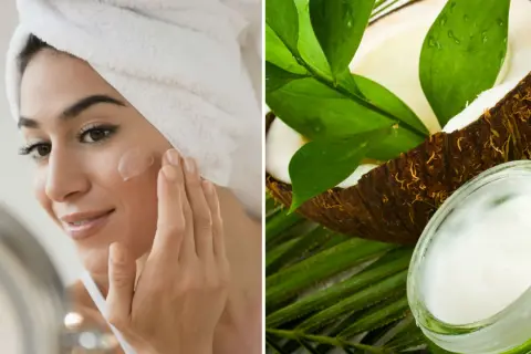 Mujer aplicándose crema en la cara, junto a un coco y un tarro de aceite de coco para la cara.
