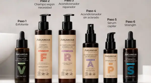 Seis productos de cuidado capilar de Arganour en fila, cada uno con un número de paso.